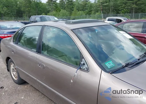 1999 Toyota Avalon Xls z USA, uszkodzony, nr VIN 4T1BF18B2XU333348